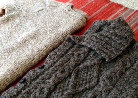 Two sweaters spun from Shetland roving from Sheep Street Fibers. Sweater on left is my first handknit sweater, weighing nearly two pounds. I spun and knit the sweater on left years later. It weighs just over one pound.